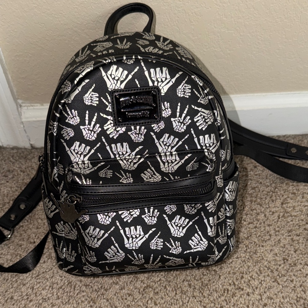 Loungefly Black and Silver Skeleton Hand Backpack